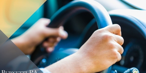 teen hands on the wheel